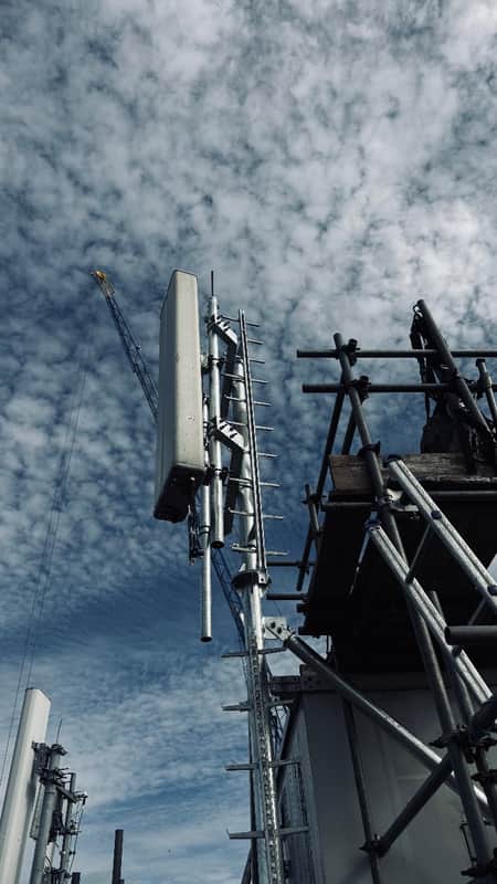 Sector antenna pole and bracing steels on a rooftop mast